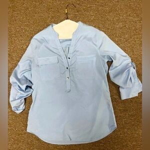 Women's blue shining blouse. Ivanka Trump